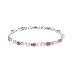 .925 Sterling Silver Pink Oval Shaped Ruby and 1/4 Cttw Diamond 7.25" Link Bracelet