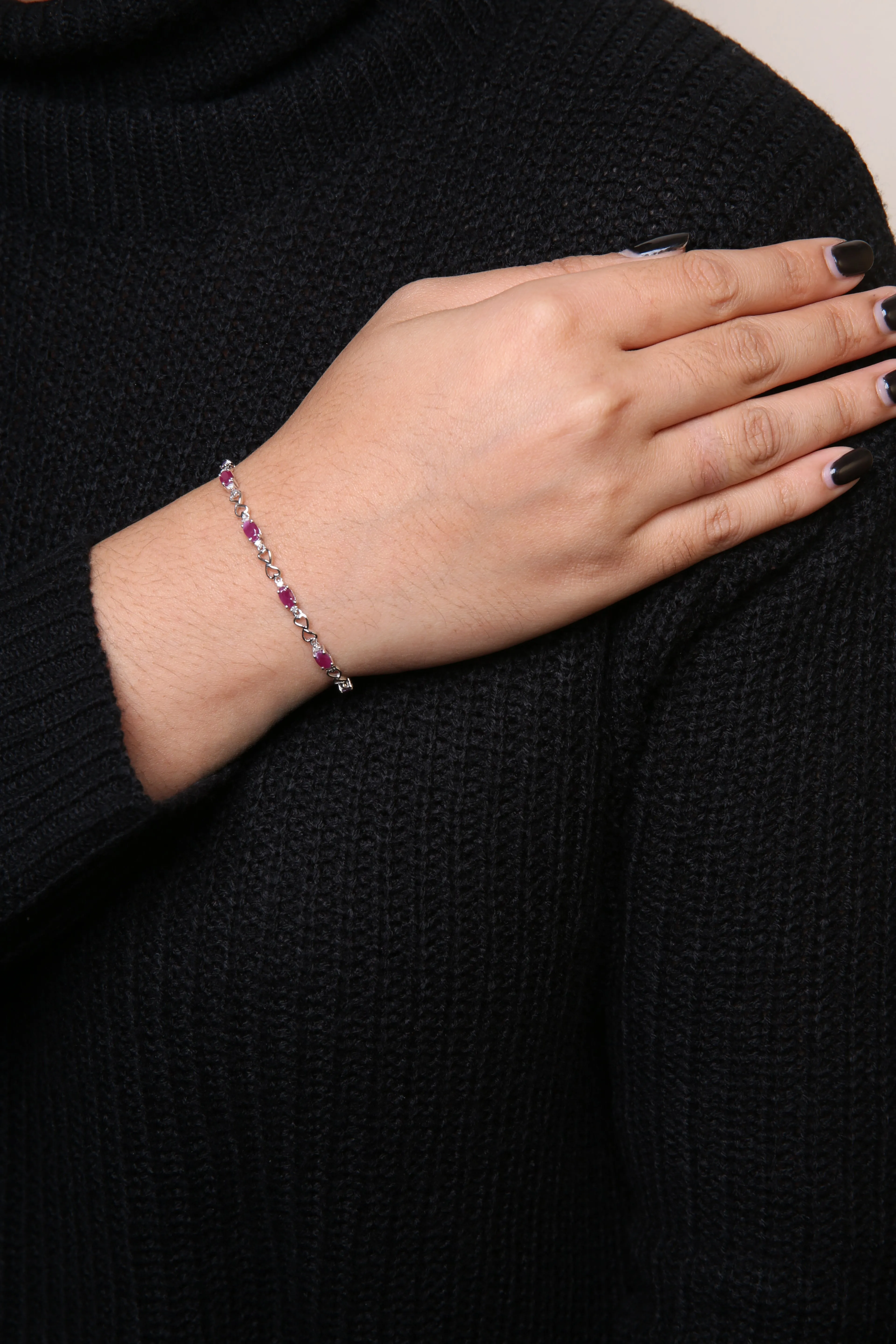 .925 Sterling Silver Pink Oval Shaped Ruby and 1/4 Cttw Diamond 7.25" Link Bracelet