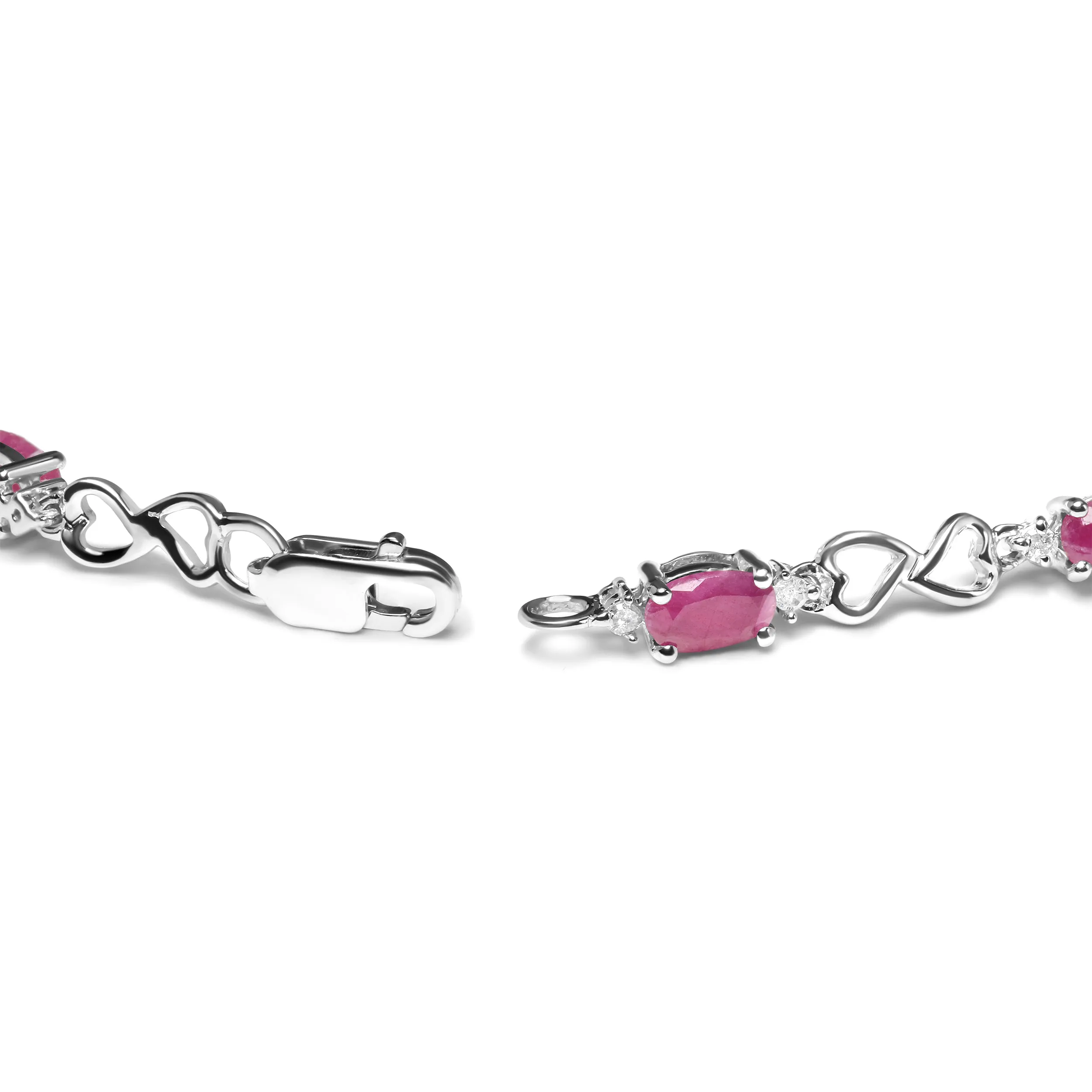.925 Sterling Silver Pink Oval Shaped Ruby and 1/4 Cttw Diamond 7.25" Link Bracelet