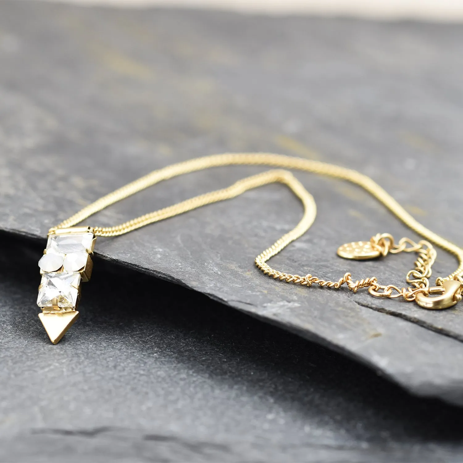 Delicate geometric crystals pendant on short necklace